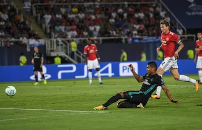 epa06132573 Casemiro of Real Madrid scores the opening goal during the UEFA Super Cup match Real Madrid vs Manchester United at the Philip II Arena in Skopje, the Former Yugoslav Republic of Macedonia on 08 August 2017.  EPA/GEORGI LICOVSKI