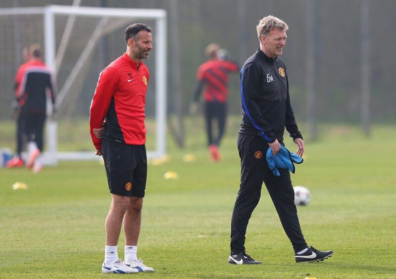 David Moyes and Ryan Giggs look on during a Manchester United training session at the end of March. Alex Livesey / Getty Images / March 31, 2014