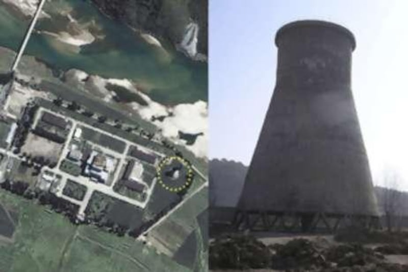 A satellite image of North Korea's Yongbyon nuclear complex, left, with the reactor's now demolished cooling tower (circled) and a view of the tower, right, as seen from the ground.