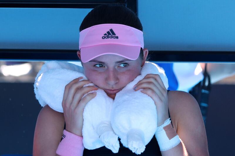 Tennis - Australian Open - First Round - Melbourne Arena, Melbourne, Australia. Latvia's Jelena Ostapenko wraps a towel filled with ice around her neck during the match against Greece's Maria Sakkari. Reuters