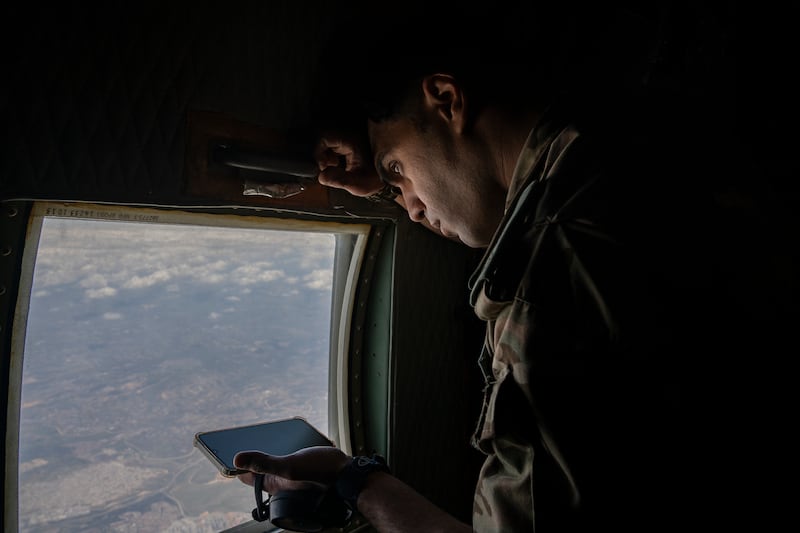 Maj Mohammed Bashabseh of Jordan's Royal Special Forces attempts to track the flight path, a task made difficult due to Israel's move to scramble GPS over Gaza. Matthew Kynaston / The National