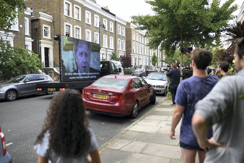 LONDON, ENGLAND - MAY 24:  A TV screen is installed in the street outside the home of Dominic Cummings, Chief Advisor to Prime Minister Boris Johnson, by political campaign group 'Led By Donkeys', on May 24, 2020 in London, England. On March 31st 2020 Downing Street confirmed to journalists that Dominic Cummings was self-isolating with COVID-19 symptoms at his home in North London. Durham police have confirmed that he was actually hundreds of miles away at his parent's house in the city. (Photo by Peter Summers/Getty Images)