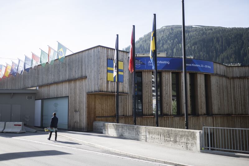 Flags fly outside the congress centre.