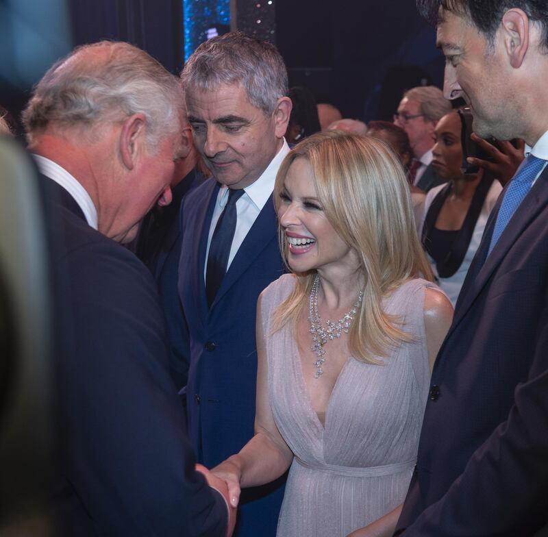 Prince Charles meets Rowan Atkinson and Kylie Minogue after attending a one off performance of We Are Most Amused and Amazed at London Palladium. WPA Pool / Getty Images