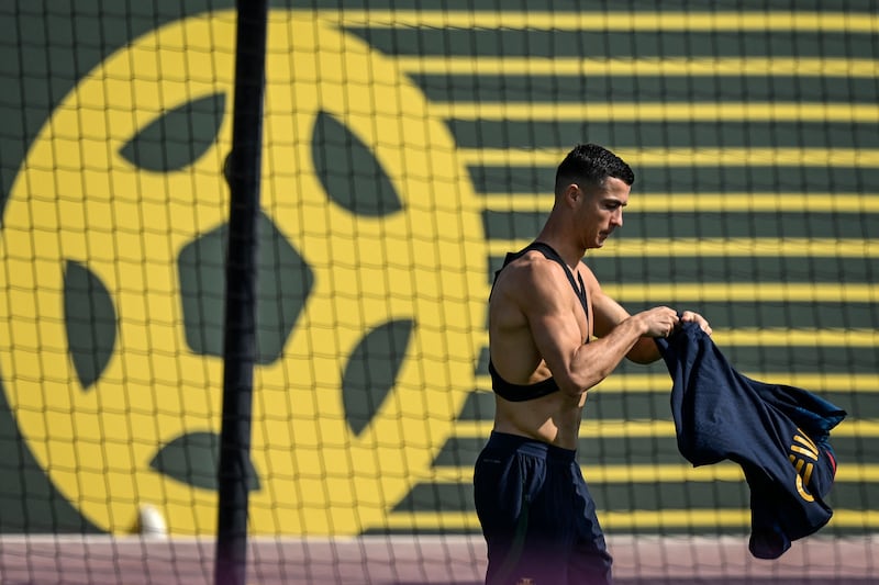Portugal forward Cristiano Ronaldo arrives for a training session at Shahaniya Sports Club of Al Samriya. AFP