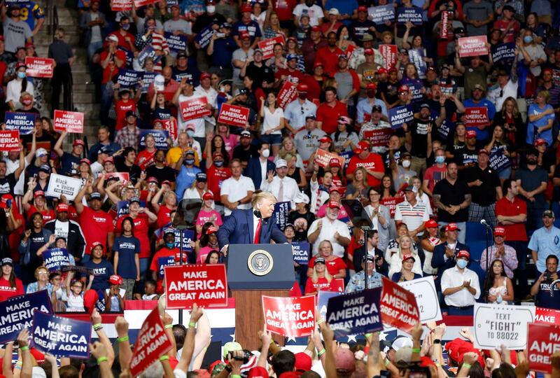 US President Donald Trump speaks at BOK Centre during his rally in Tulsa, Oklahoma. Tulsa World via AP