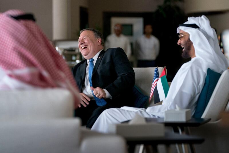 Sheikh Mohammed laughs with Mr Pompeo as they meet at the Al Shati Palace. AP Photo