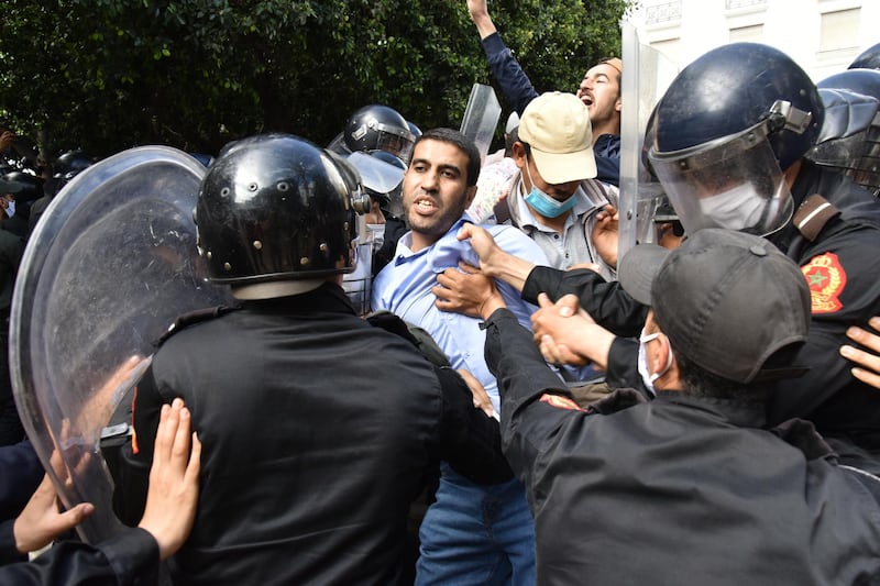 Security forces disperse a protest in solidarity with Palestinians held in front of the Parliament building in Rabat, Morocco. EPA