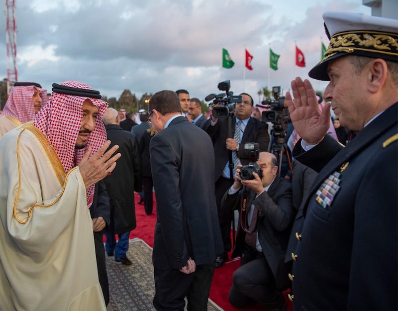 A handout photo made available by the Saudi Royal Palace shows Saudi King Salman bin Abdulaziz Al Saud (L) greeting delegates upon his arrival in Tunis, Tunisia.  EPA