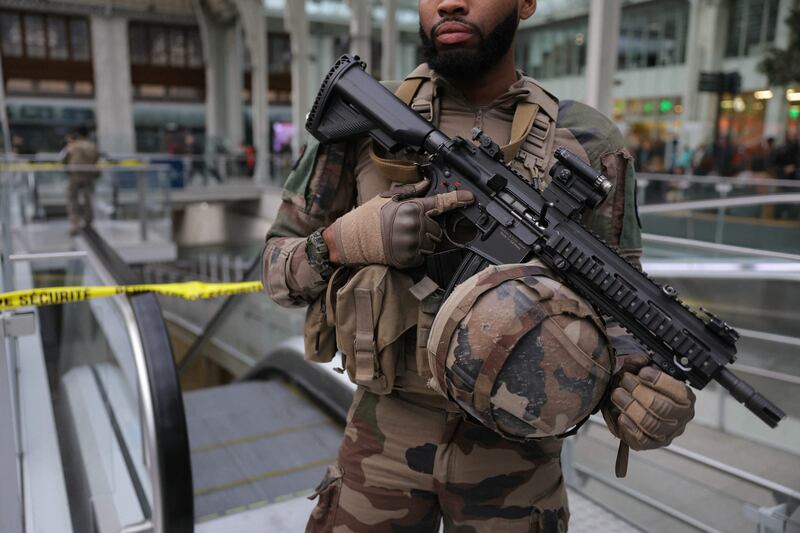 A French soldier guards a security perimeter after a knife attack at Paris's Gare de Lyon railway station. AFP