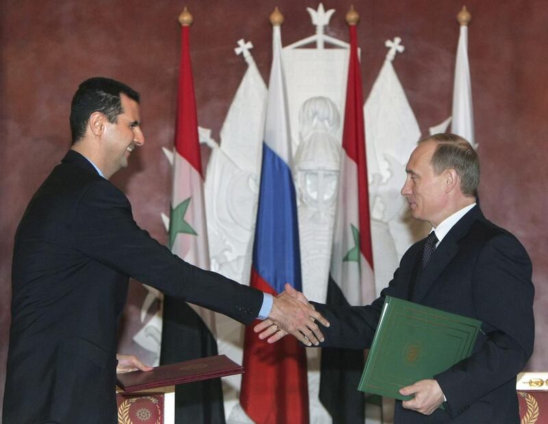 Syrian President Bashar Al Assad with Russian President Vladimir Putin. Sergei Chirikov / AP