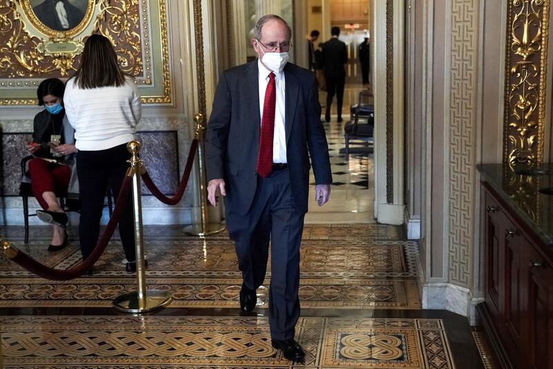 Sen. Jim Risch, R-Idaho, walks on Capitol Hill during the fifth day of the second impeachment trial of former President Trump, Saturday, Feb. 13, 2021 at the Capitol in Washington. (Greg Nash/Pool via AP)