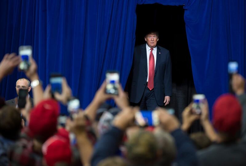 US President Donald J Trump walks out from back stage to cheering supporters during a rally at the Mayo Civic Center in Rochester, Minnesota, USA.  EPA