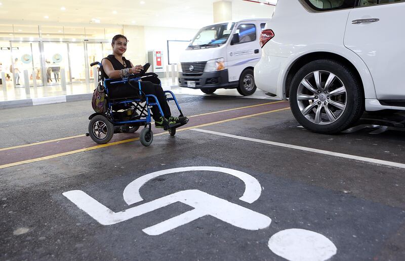 Dubai, 09, March, 2017: Shobhika Kalra, founder of WingsOfAngelz, who uses a wheelchair and the metro to get around pose during the interview  in Dubai. ( Satish Kumar / The National ) 
ID No: 24733
Section: News
Reporter: Dana Moukhallati *** Local Caption ***  SK-ShobhikaKalra-09032017-03.jpg