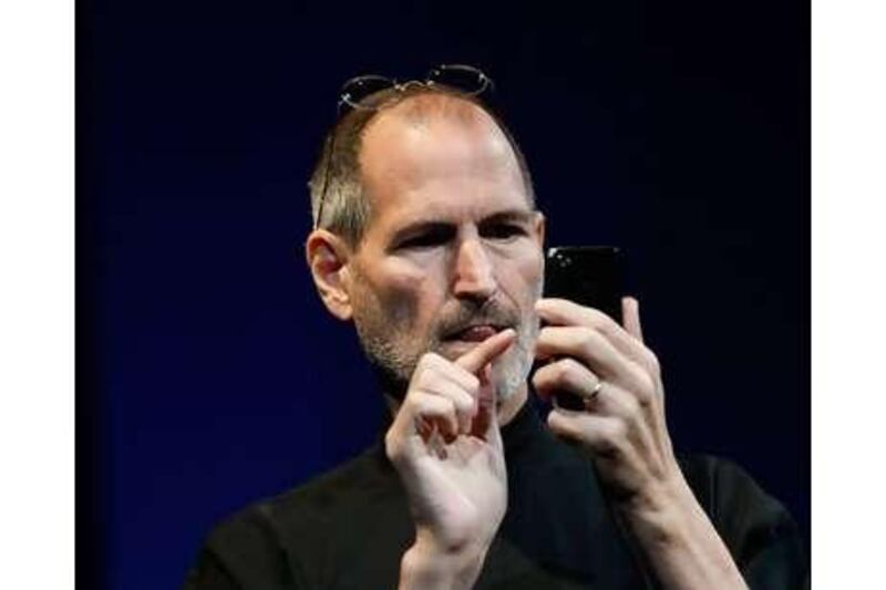Steve Jobs demonstrates the new iPhone during the Apple Worldwide Developers Conference.