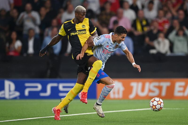 United's Cristiano Ronaldo goes down in thebox under the challenge of Mohamed Ali Camara of Young Boys but no penalty was given. Getty