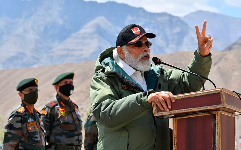 In this handout photo provided by the Press Information Bureau, Indian Prime Minister Narendra Modi adresses soldiers during a visit to Nimu, Ladakh area, India, Friday, July 3, 2020. Modi made an unannounced visit Friday to a military base in remote Ladakh region bordering China where the soldiers of the two countries have been facing off for nearly two months. Modiâ€™s visit comes in the backdrop of massive Indian army build-up in Ladakh region following hand-to-hand combat between Indian and Chinese soldiers on June 15 that left 20 Indian soldiers dead and dozens injured, the worst military confrontation in over four decades between the Asian giants. (Press Information Bureau via AP)