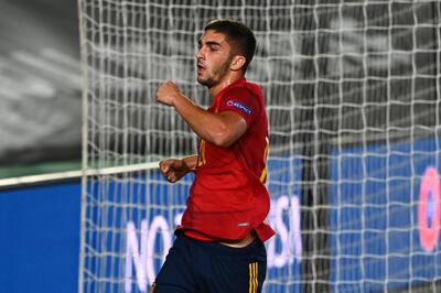 Spain's midfielder Ferran Torres celebrates after scoring a goal during the UEFA Nations League A group 4 football match between Spain and Ukraine at the Alfredo Di Stefano Stadium in Madrid on September 6, 2020. / AFP / GABRIEL BOUYS
