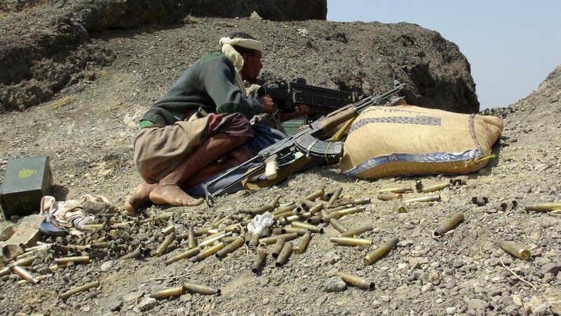 A fighter loyal to Yemen’s government takes up position at the front line against Houthi fighters in the southern province of Lahj on October 30, 2015. Reuters