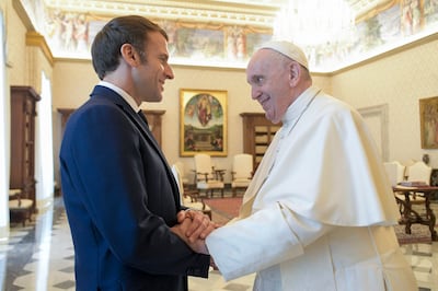Pope Francis receives French President Emmanuel Macron in a private audience at the Vatican in November 2021. EPA