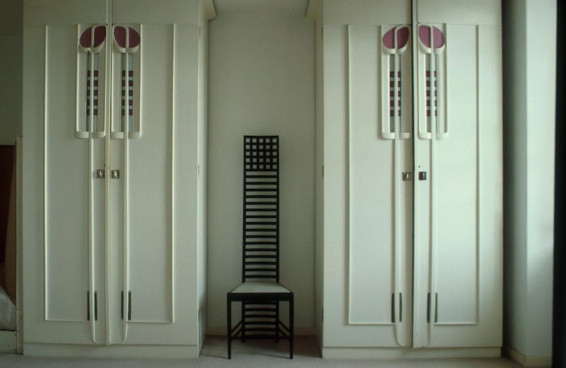 A detail of a typical Charles Rennie Mackintosh chair at Hill House, Helensburgh, Argyll & Bute