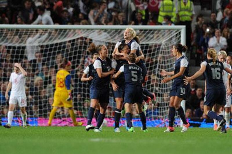 Abby Wambach celebrates scoring for the USA against Canada at Old Trafford in the Olympic women's football semi-final