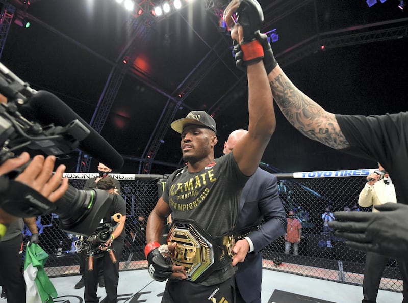 ABU DHABI, UNITED ARAB EMIRATES - JULY 12: Kamaru Usman of Nigeria celebrates after his victory over Jorge Masvidal in their UFC welterweight championship fight during the UFC 251 event at Flash Forum on UFC Fight Island on July 12, 2020 on Yas Island, Abu Dhabi, United Arab Emirates. (Photo by Jeff Bottari/Zuffa LLC)