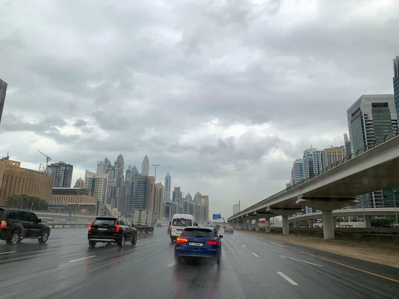 Traffic during the rain on Sheikh Zayed Road in Dubai. Police warned drivers of dangerous conditions. Pawan Singh / The National