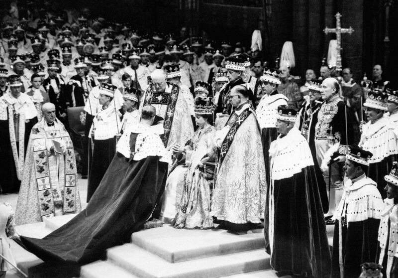 The Duke of Norfolk, the Earl Marshall, paying homage to Queen Elizabeth after her coronation at Westminster Abbey. 