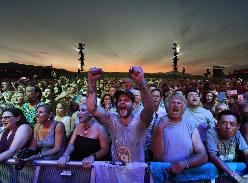 Desert Trip festival-goers ranged from baby boomers to millennials as music fans gathered at the Empire Polo Club, Palm Springs, to watch six legendary rock acts play. Mark Ralston / AFP. 
