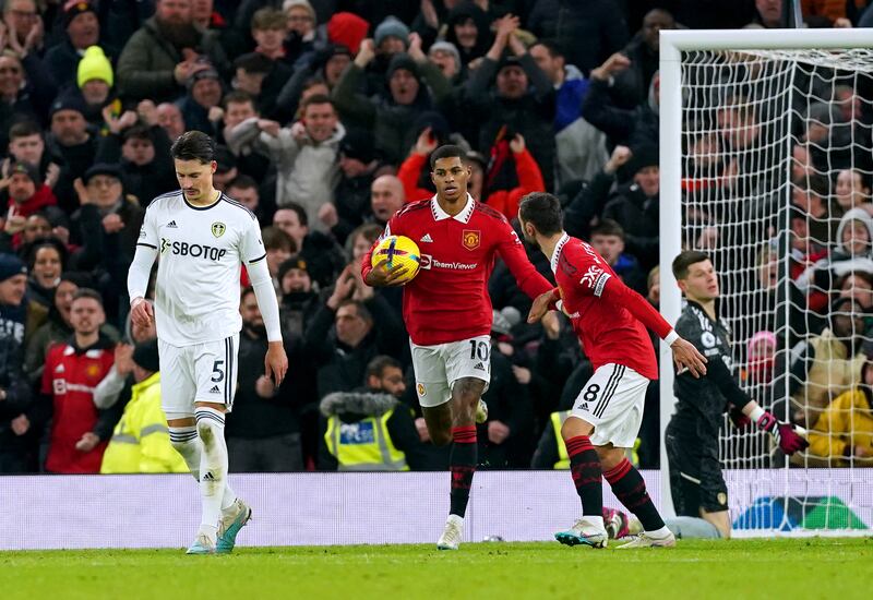 United's Marcus Rashford celebrates scoring their first goal. PA