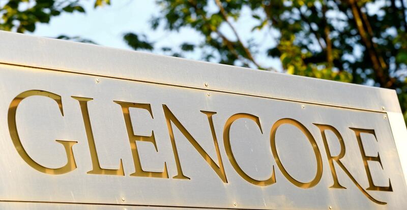 FILE PHOTO: The logo of commodities trader Glencore is pictured in front of the company's headquarters in Baar, Switzerland, July 18, 2017.  REUTERS/Arnd Wiegmann/File Photo