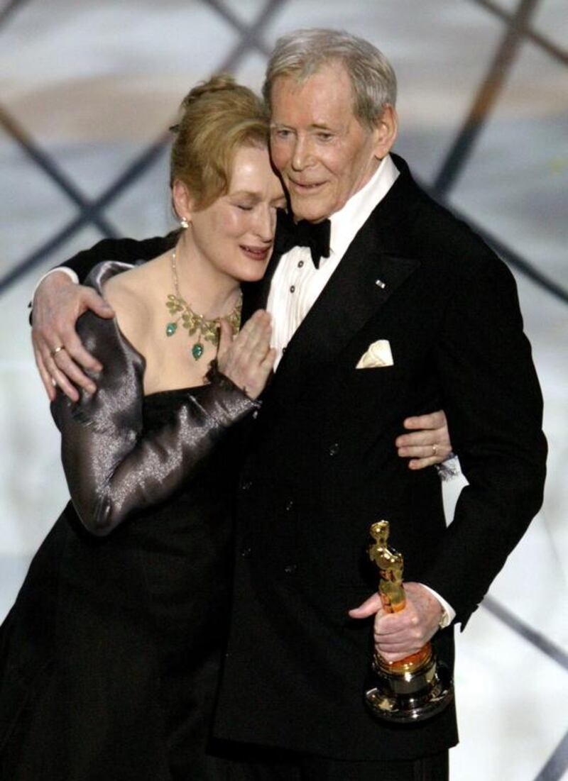 Actor Peter O'Toole is embraced by actress and presenter Meryl Streep after O'Toole received an honorary Oscar for lifetime achievement at the 75th annual Academy Awards in 2003. Reuters