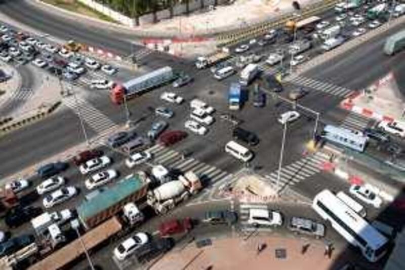 Abu Dhabi - November 22, 2008: A traffic jam at the interesection of Mina Road and Old Mazed St in the Tourist Club Area on a Saturday afternoon in Abu Dhabi, November 22, 2008. FOR STOCK (Jeff Topping/The National) *** Local Caption ***  JT001-1122-TRAFFIC JAM STOCK IMG_0939.jpgJT001-1122-TRAFFIC JAM STOCK IMG_0939.jpg