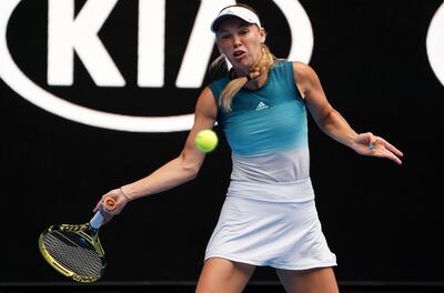 epa07288506 Caroline Wozniacki of Denmark in action against Johanna Larsson of Sweden during their women's second round match on day three of the Australian Open tennis tournament in Melbourne, Australia, 16 January 2019.  EPA/MARK DADSWELL  AUSTRALIA AND NEW ZEALAND OUT