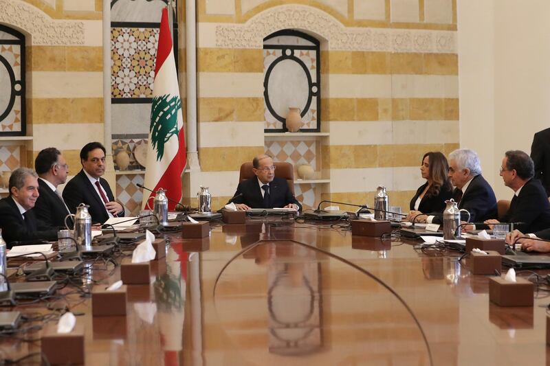 Lebanese President Michel Aoun heads the first meeting of Prime Minister Hassan Diab's newly formed government. AP