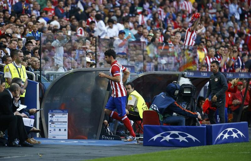 Atletico Madrid striker Diego Costa runs to the tunnel after being substituted during the Champions League final against Real Madrid on Saturday. Kai Pfaffenbach / Reuters / May 24, 2014