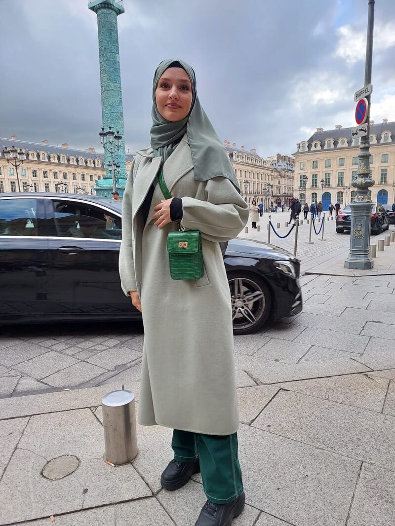 In head-to-toe green, this visitor made modest fashion look effortless at Place Vendome.