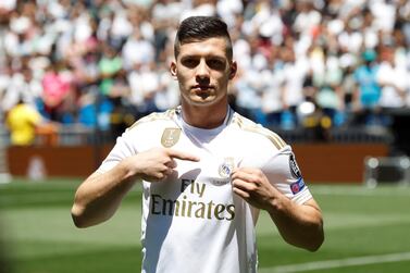 epa07643399 Real Madrid's new soccer player Luka Jovic poses during his presentation at Santiago Bernabeu stadium in Madrid, Spain, 12 June 2019. Jovic has signed a five-seasons-contract with Real Madrid after Spanish LaLiga's club Real Madrid reached an agreement with Eintracht Frankfurt for his transfer in the region of 60 million euro plus five on variables. EPA/Juan Carlos Hidalgo