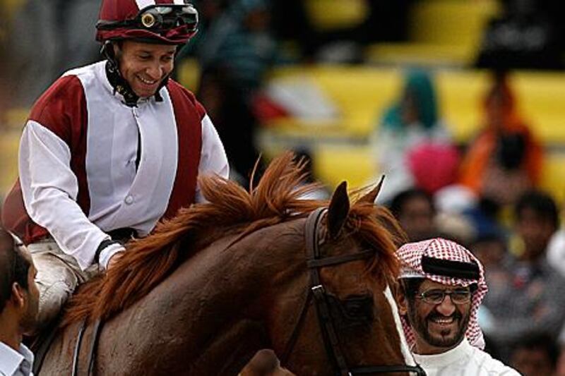 Ali Rashid al Raihe, right, and his stable jockey Royston Ffrench, are all smiles after a win.