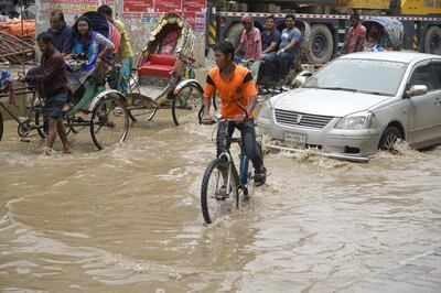 Scientists say global warming will increase the risk of weather disasters such as floods, seen here in Bangladesh. EPA 