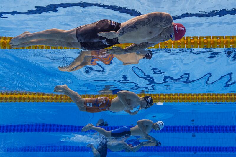 The men's 100m breaststroke final at the Tokyo Aquatics Centre.