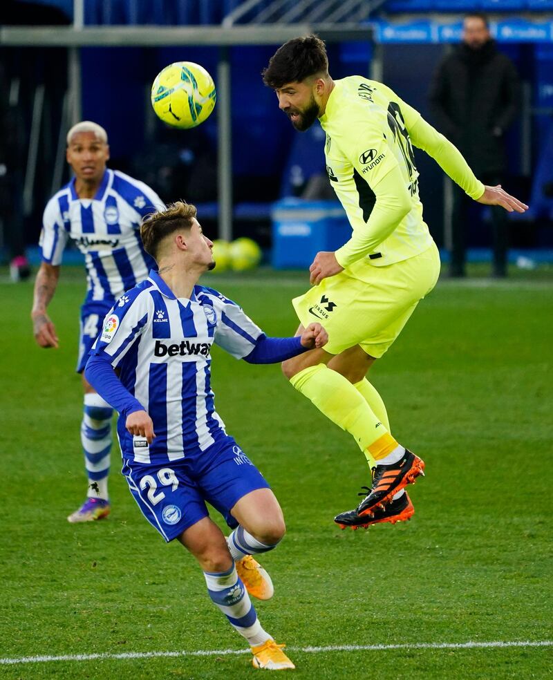 Atletico Madrid's Felipe heads the ball. Reuters