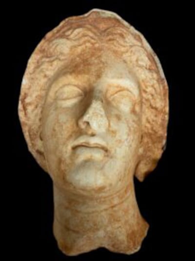 Michael Steinhardt's collection included this $1.2m piece 'Veiled Head of a Female', which was returned to Libya after its looting during civil unrest.