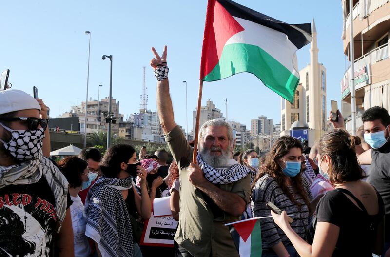 Supporters of Lebanese leftist parties protest in support of the Palestinians in Jerusalem, as they march from Mar Elias camp to the Chatila Palestinian camp in Beirut, Lebanon. EPA