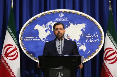Iranian foreign ministry spokesman Saied Khatibzadeh gestures during a press conference in Tehran on February 22, 2021. Iran hailed as a "significant achievement" a temporary agreement Tehran reached with the head of the UN nuclear watchdog on site inspections. That deal effectively bought time as the United States, European powers and Tehran try to salvage the 2015 nuclear agreement that has been on the brink of collapse since Donald Trump withdrew from it.
 / AFP / ATTA KENARE
