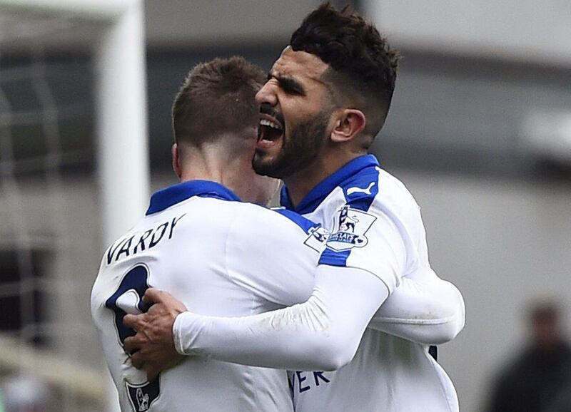 Riyad Mahrez celebrates with Jamie Vardy after scoring the first goal for Leicester City. Reuters / Dylan Martinez