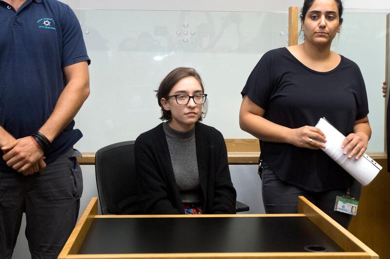 FILE - In this Thursday, Oct. 11, 2018 file photo, American Lara Alqasem sits in a courtroom prior to a hearing at the district court in Tel Aviv, Israel. Lawyers for Alqasem who was denied entry to Israel because of alleged support for a boycott campaign say the Supreme Court has accepted her appeal and will allow her study at Hebrew University, where she had been registered for classes. (AP Photo/Sebastian Scheiner, File)