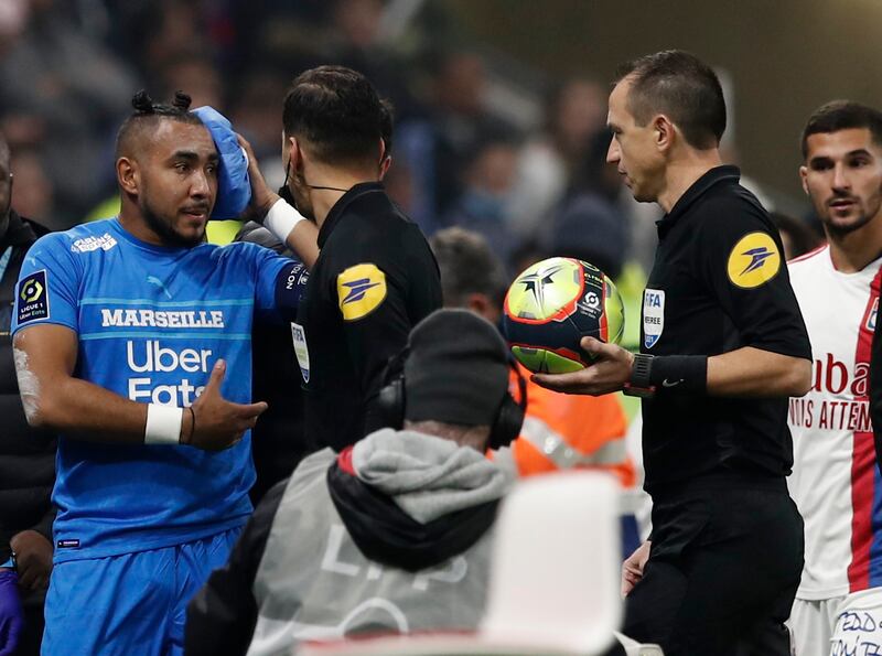 Marseille's Dimitri Payet walks off the pitch injured. Reuters
