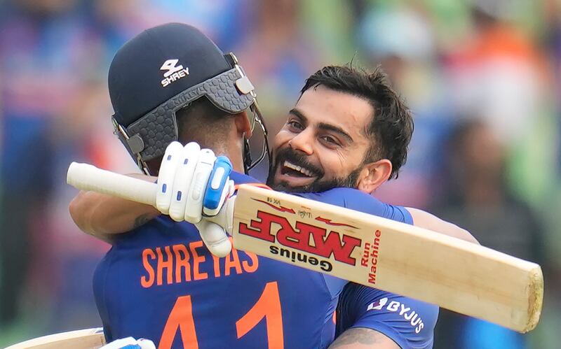India's Shreyas Iyer hugs Virat Kohli after Kohli scored century during the third one-day international cricket match between India and Sri Lanka in Thiruvananthapuram, India, Sunday, Jan.  15, 2023.  (AP Photo / Aijaz Rahi)